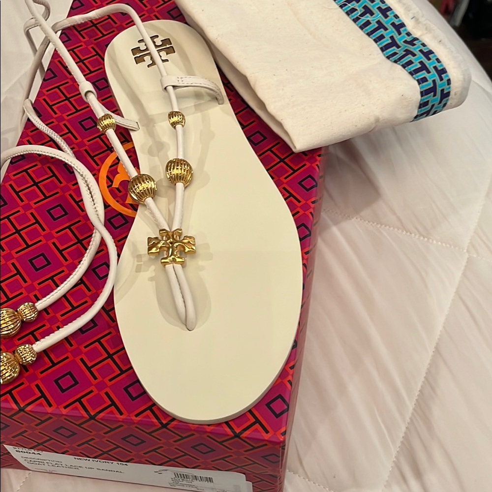 Tory Burch,Capri White and Gold Lace up Sandals with Elegant Charms